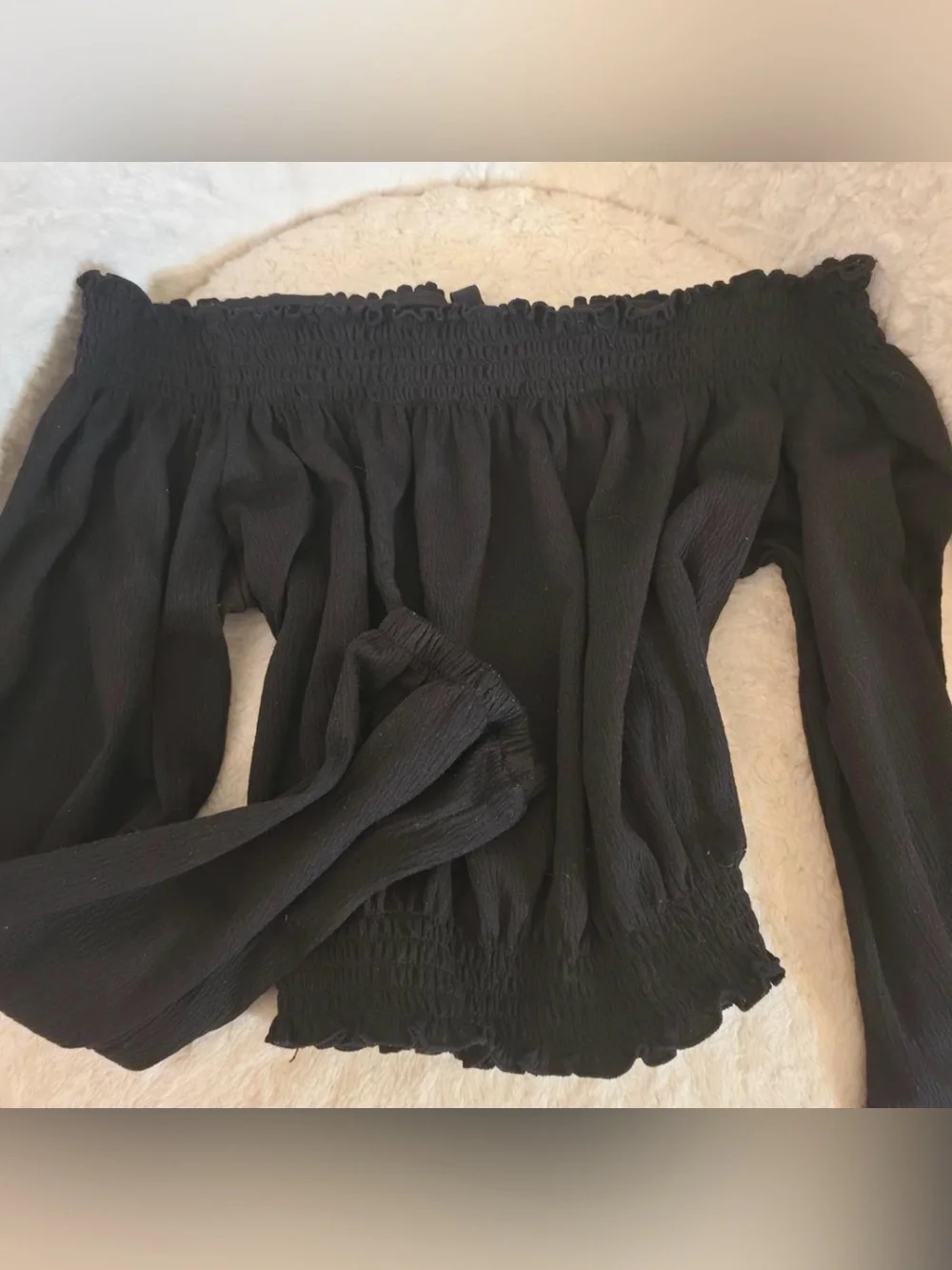 H&M women’s black off the shoulder long sleeve blouse. Size large.